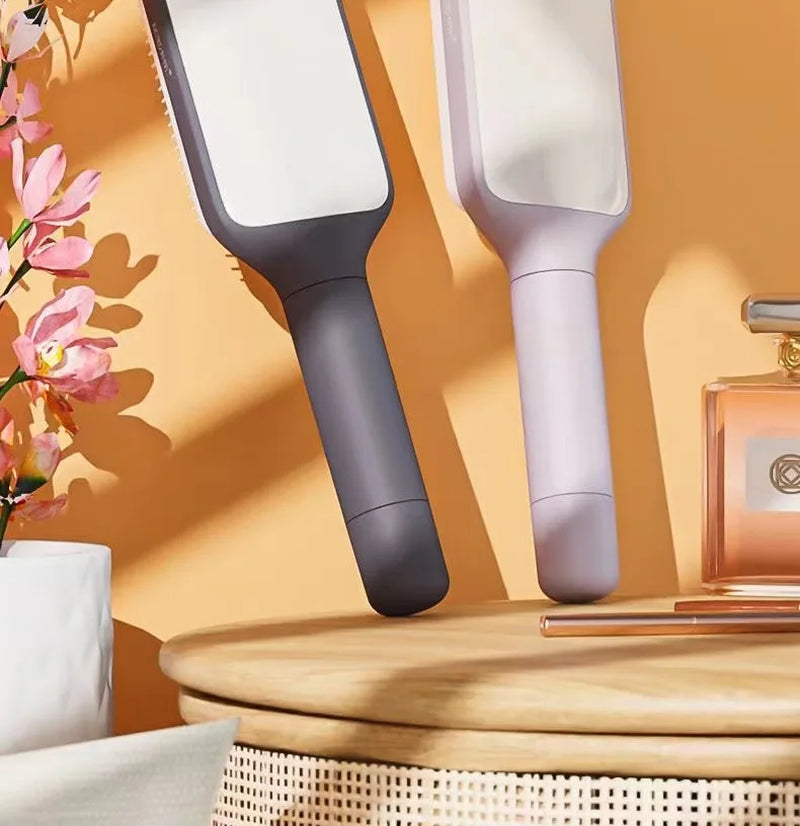 Brosse Démêlante à Manche Rotatif – Retrait Instantané des Cheveux