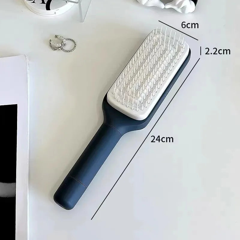 Brosse Démêlante à Manche Rotatif – Retrait Instantané des Cheveux