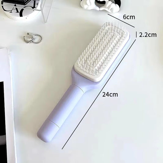 Brosse Démêlante à Manche Rotatif – Retrait Instantané des Cheveux