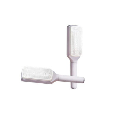 Brosse Démêlante à Manche Rotatif – Retrait Instantané des Cheveux